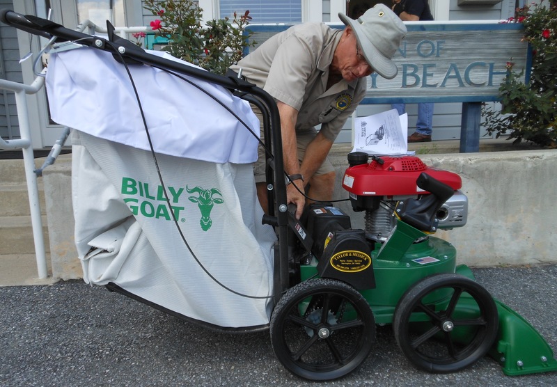 Dewey Beach Town Manager Marc Appelbaum and Starboard owner Steve Montgomery have put aside a disagreement from earlier this summer regarding contributions made to the town specifically for the police department. As a result the town now has a new street sweeper. Here Alvin Huffman, town maintenance supervisor, shows off the new machine. BY CHRIS FLOOD